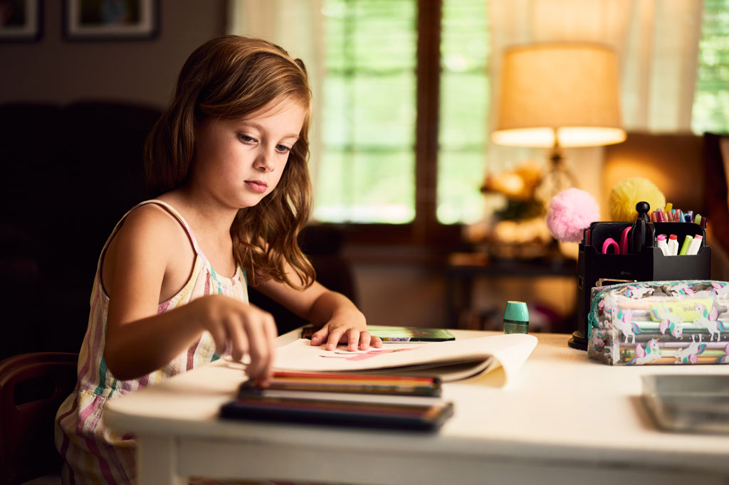 Photo of a child drawing a picture